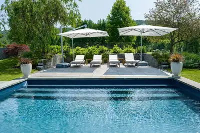 Image de 3 bedroom house with a heated pool