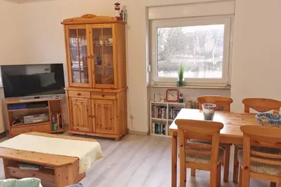 Image de Nordsee Ferienwohnung Dornumersiel - Direkt am Siel mit Blick auf Wasser -