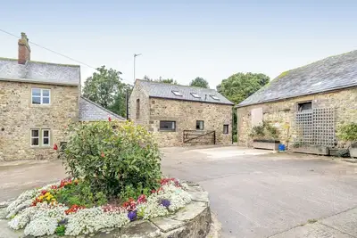 Image de A converted barn oozing luxury and style throughout.