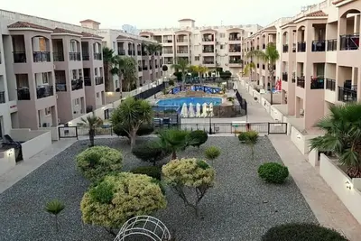 Image de A sunny paradise with a great swimming pool close to the sea.