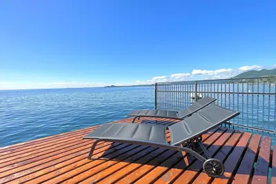 Image de Villa Magnolia Garda Villa en bord de lac avec parc, ponton privé et piscine.