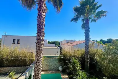 Image de Maison Palmeraie avec jardin et piscine