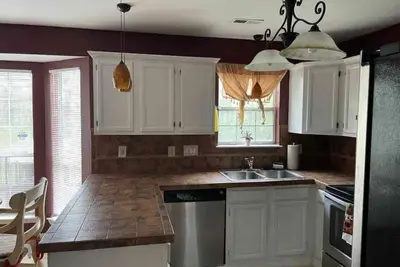 Image de Cozy home minutes from Pnc and Nascar Speedway