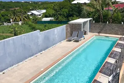 Image de Appartement T2 avec piscine de 15m, à 2 minutes de Anse des rochers