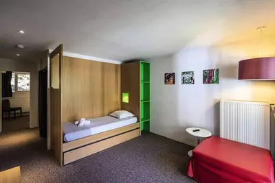 Image de Logement Classique 1 Chambre 3 Adultes et 1 Enfant avec balcon