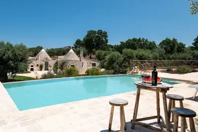 Image de New renovation Luxury Trulli Ericla Resort with infinity pool and olive trees