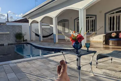 Image de Very spacious and comfortable home, with many varandas, pool on the beach block.