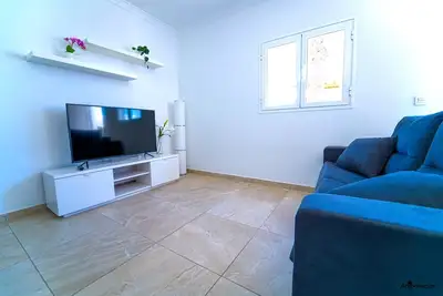 Appartement d’une chambre avec grand salon dans un complexe de vacances.