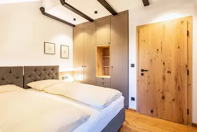 Image de Résidence Skutial Appartement Santner avec vue sur les montagnes, balcons et Wi-Fi.