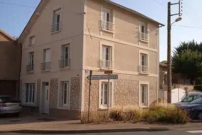 Image de Maison à Étages Avec Jardin