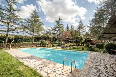 Image de Appartement 'Glicine ad Antico Casale '700' avec piscine partagée et Wi-Fi