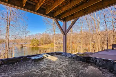 Image de Dog-friendly lakefront home with hot tub, dock, kayaks, & game room