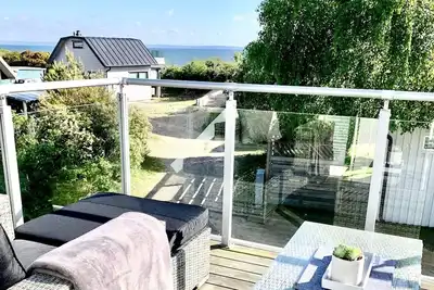 Image de Maison de vacances pour 6 a Halmstad-By Traum