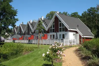 Image de Ferienhaus „Falster“ 88m² für 4+2 Personen im Schlosspark Bad Saarow, Sauna, Whirlpool und Kamin