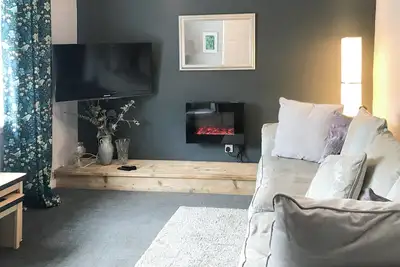 Image de Kitty’s Cottage is a 2-bedroom terraced cottage about 120 yards from Girvan’s sandy beach.
