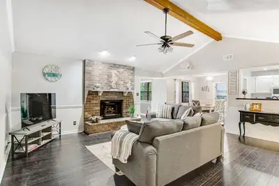 Coastal home with fantastic backyard, firepit, game room & prime location