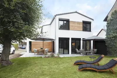 Image de Ferienhaus für 1-12 Personen, mit 4 Schlafzimmern
