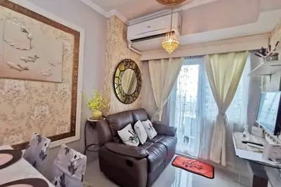 Image de vintage 2 bedroom unit with jacuzzi