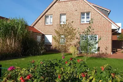Strandnahe Ferienwohnung mit Terrassen und Garten Strandkorb am Sandstrand Inkl