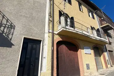 Peppe and Lucia's house, adjacent to the home of Lucio Battisti