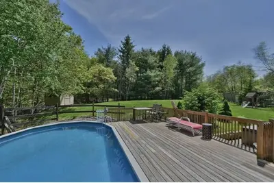 Image de Four seasons vacation home 4 Br with outdoor Hut tub and swimming pool.