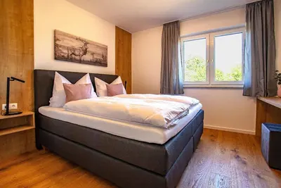 Image de Familienfreundliche Ferienwohnung mit Terasse und Garten