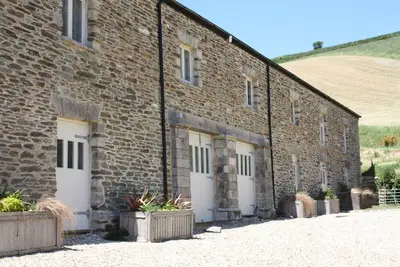 Image de The Snug - Beautiful Grade 2 listed barn conversion