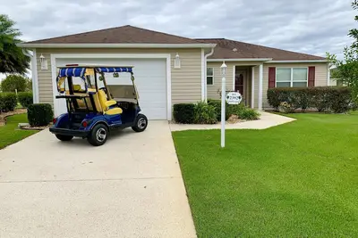 Image de Beautiful 3/2 Home with gas Golf Cart & WiFi Located in Tamarind Grove