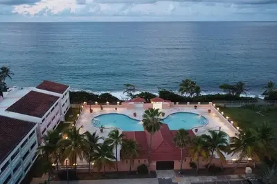 Image de Beautiful Studio in front of the Beach with Pool!