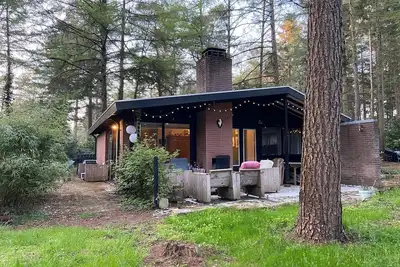 Image de Heerlijk Natuurhuisje Midden in het bos