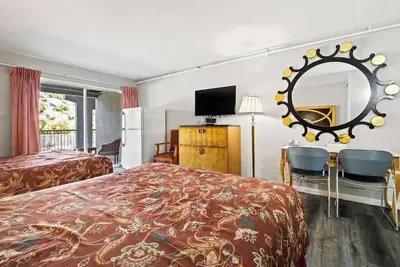 Image de (Cozy studio, 2bed, 1ba, No kitchen)