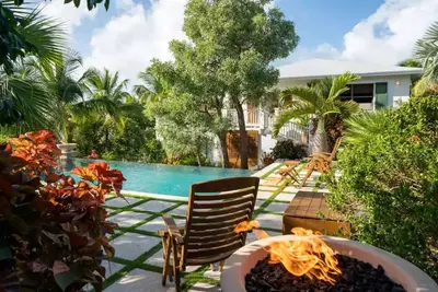 Sprawling Caribbean Beachfront Estate - Multiple Suites- Private Manicured Beach