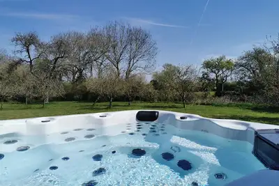 Large three bedroom lodge with private hot tub, located in the heart of Somerset.