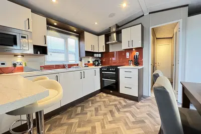 Image de Stewarts Resort Lodge 32 - a lodge that sleeps 6 guests in 3 bedrooms