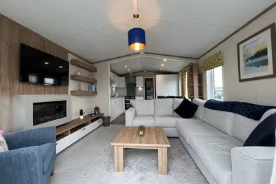 Image de Stewart Resort Lodge 21 is a luxury lodge that sleeps 4 guests in 2 bedrooms
