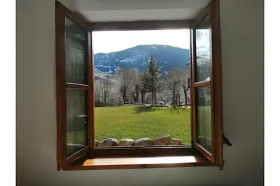 Image de First floor apartment with garden Dellui 2