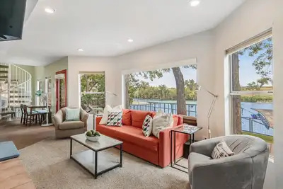 Two-story waterfront retreat with boat dock, two firepits & two kayaks