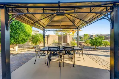 Image de Comfortable home in quiet area with enclosed yard, gazebo, W\/D, & central Ac