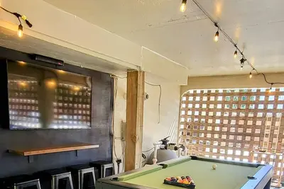 Image de Updated beach house with private pool, hot tub, and community fitness center!