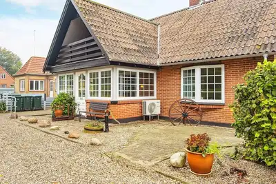 Image de Maison de vacances pour 9 a Højer-By Traum