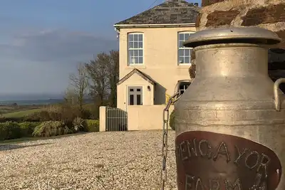 Image de Farmhouse with Sea Views - walk to the beach!