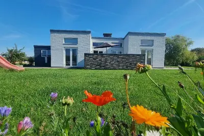 Image de Schickes Ferienhaus auf Einem Eingezäunten Grundstück