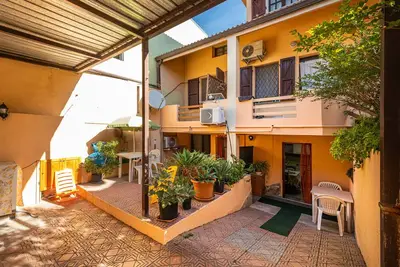 Image de Appartement \"Villa Gianna - Renato\" avec terrasses privées, jardin partagé et Wi-Fi.