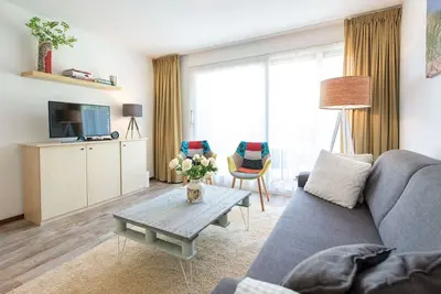 Comfortable apartment close to amenities, pool, beach, forest and dunes.