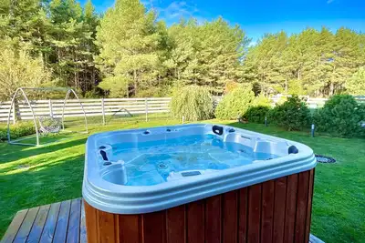 Image de Seaside apartment with private garden & forest view - only 3 min from the beach!