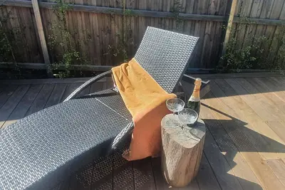 Image de Modern home. Feels isolated but close to township!