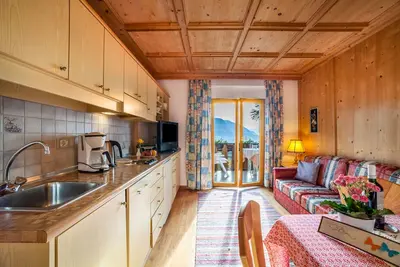 Image de Appartement \"Adang Ferienwohnung Etschtal\" avec vue sur les montagnes, jardin et Wi-Fi.