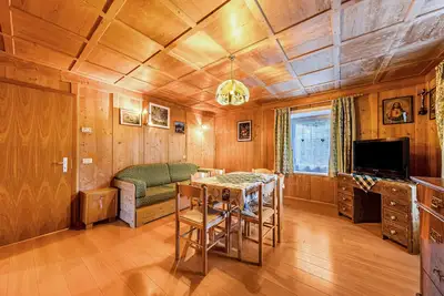 Appartement de vacances \"Ciasa Tach\" avec vue sur les montagnes, balcon et Wi-Fi.
