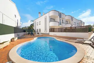 Image de Appartement \"Sunset\" avec piscine partagée, terrasse privée et Wi-Fi