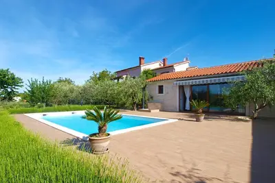 Image de Maison de vacances pour 8 personnes env. 120 qmà Valbandon, Istrie (Istrische Riviera)